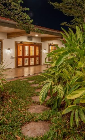 private pool villa near Pune with garden entrance and luxury stay setting